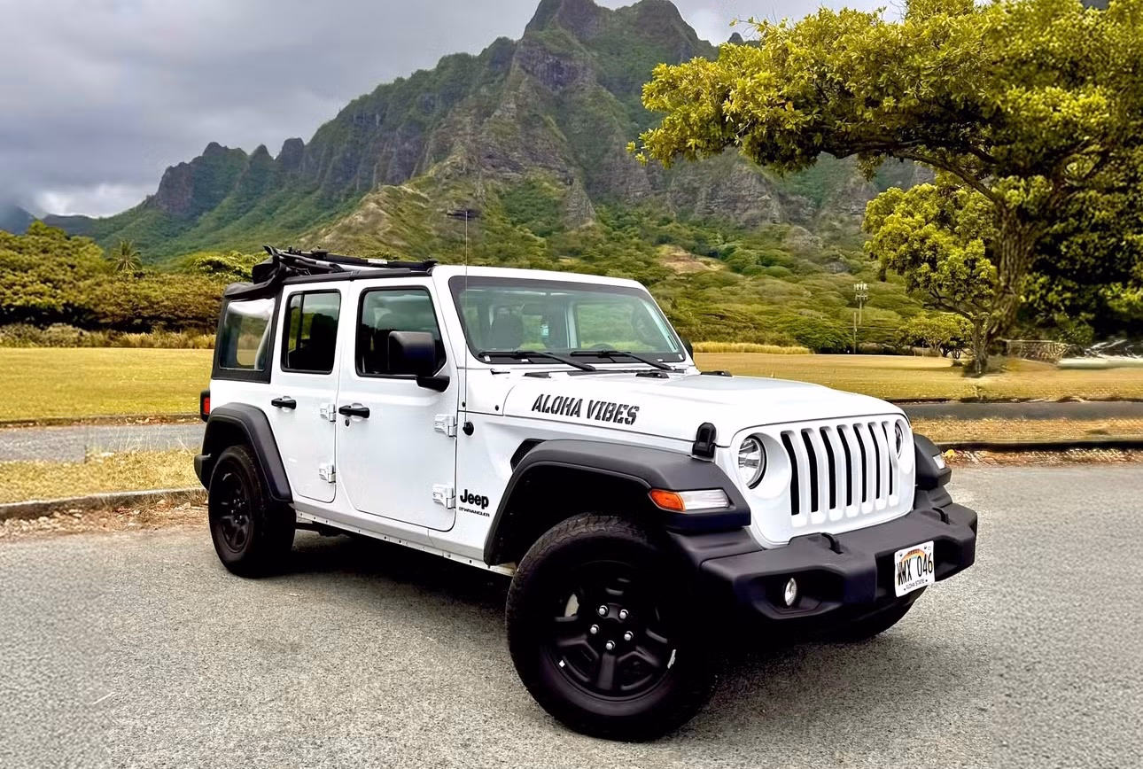 White soft-top Jeep Wrangler