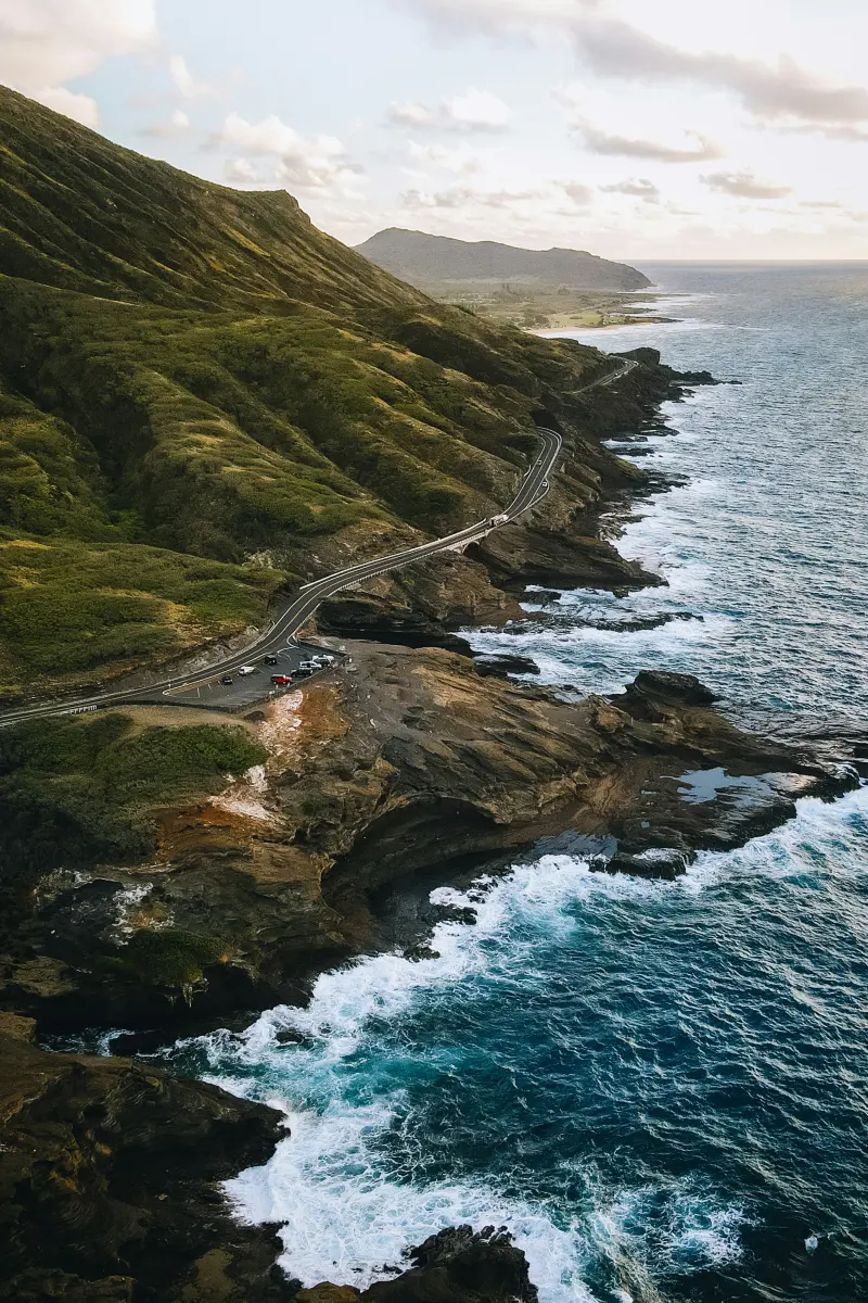 Winding coastal road between Oahu's mountains and ocean